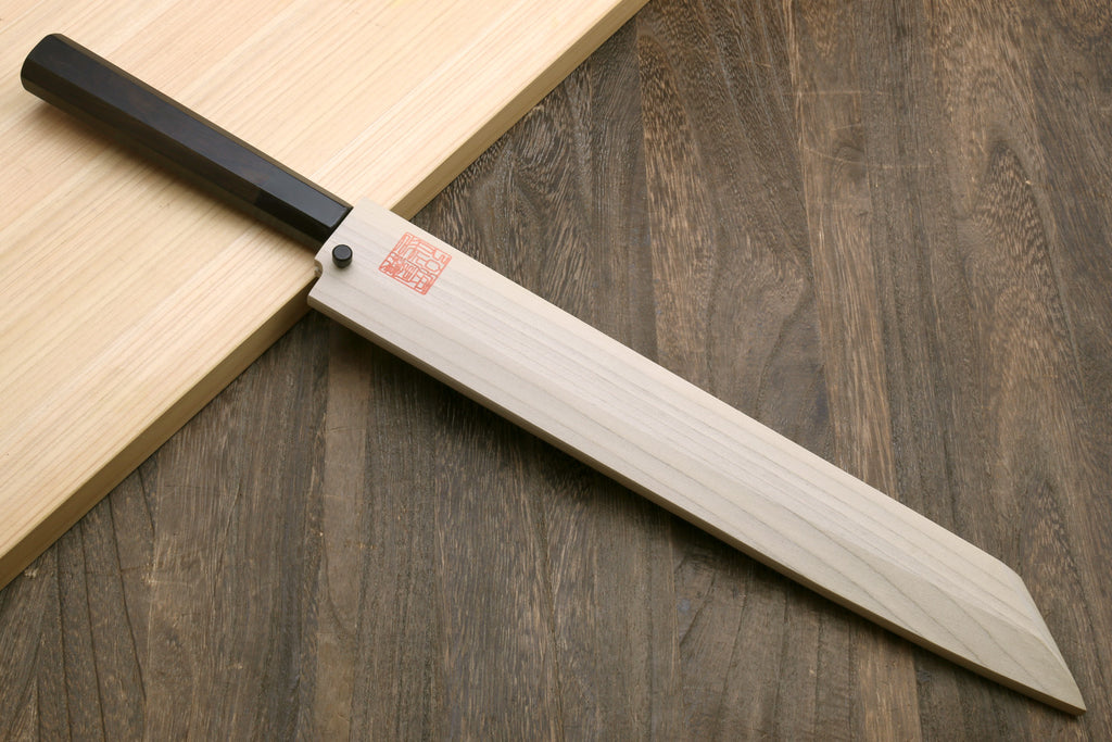 Japanese kiritsuke sushi knife with mirror-polished blade and black ebony handle
