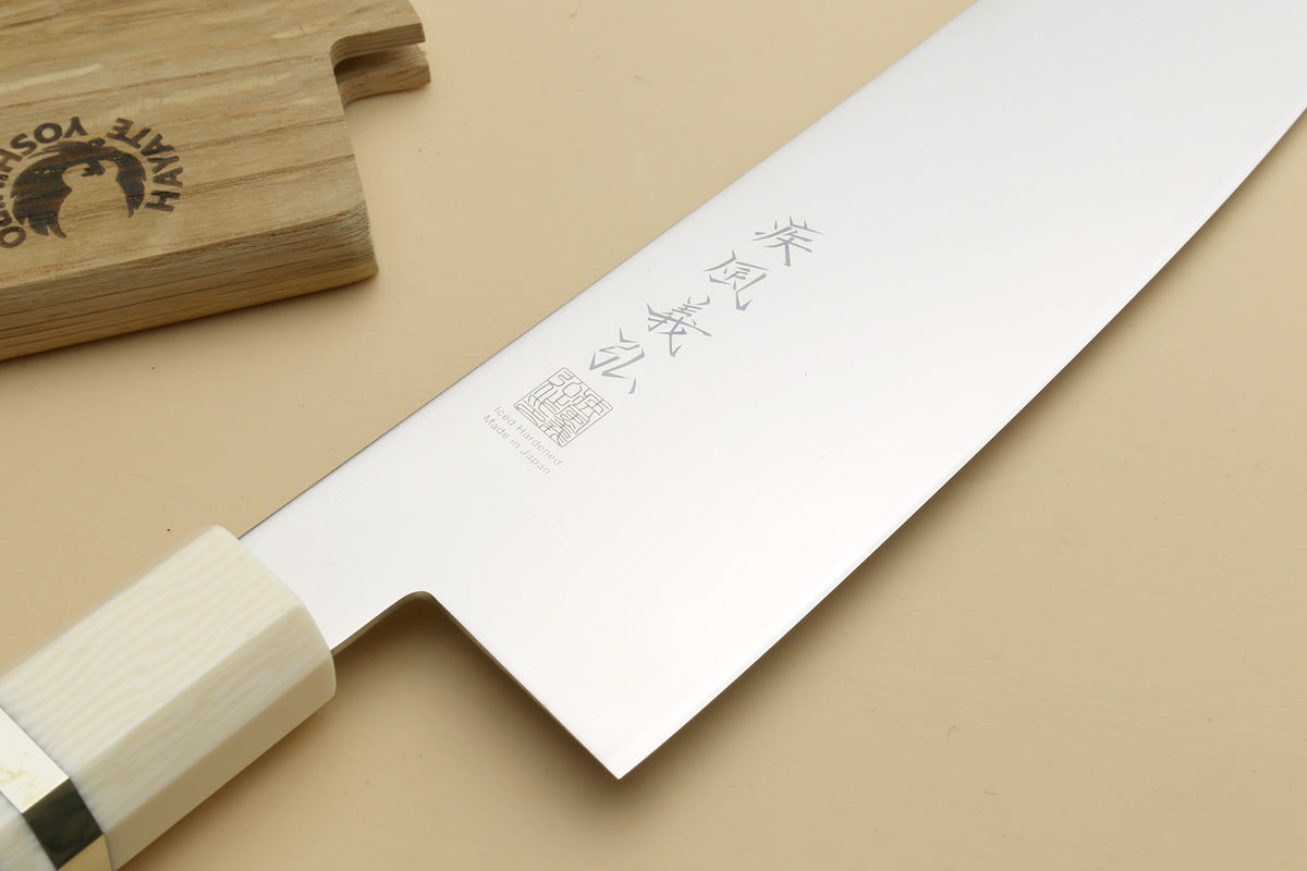Japanese chef knife blade with engraved markings, ivory bolster and rosewood handle