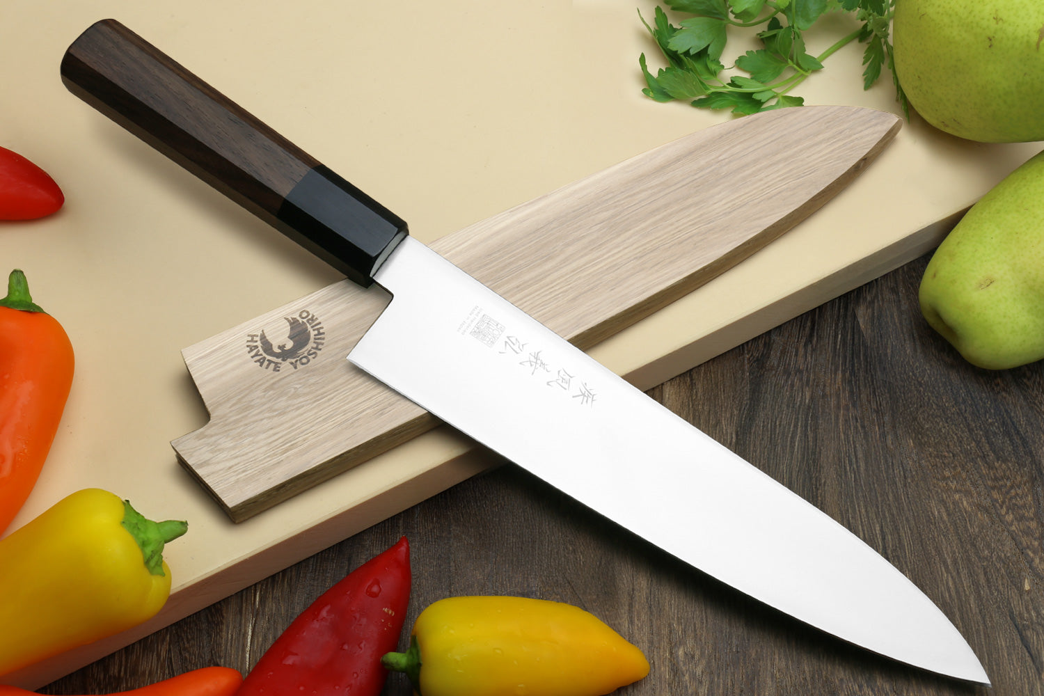 Japanese chef knife with ice-hardened stainless blade and Shitan rosewood handle