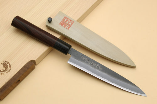 Petty knife with dark wood handle and blue steel blade, with black saya cover