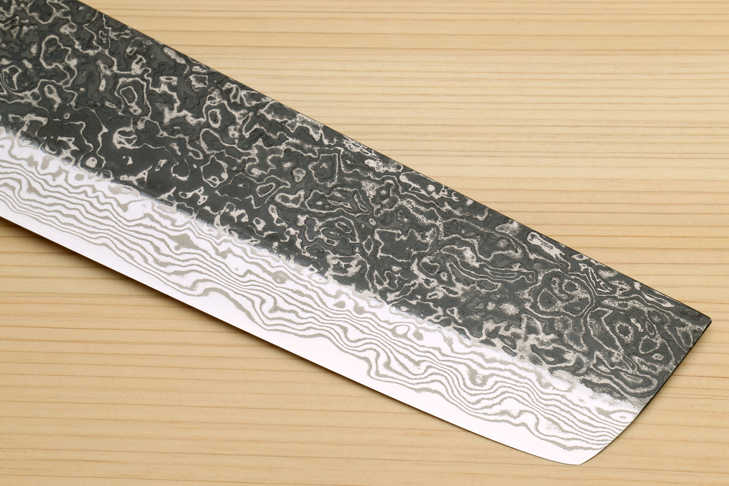 Damascus nakiri vegetable knife with ironwood handle and wavy dark steel blade