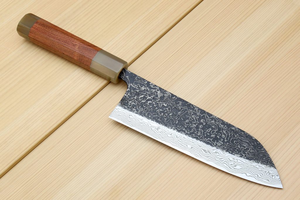 Damascus santoku chef knife with ironwood handle and dark wavy blade