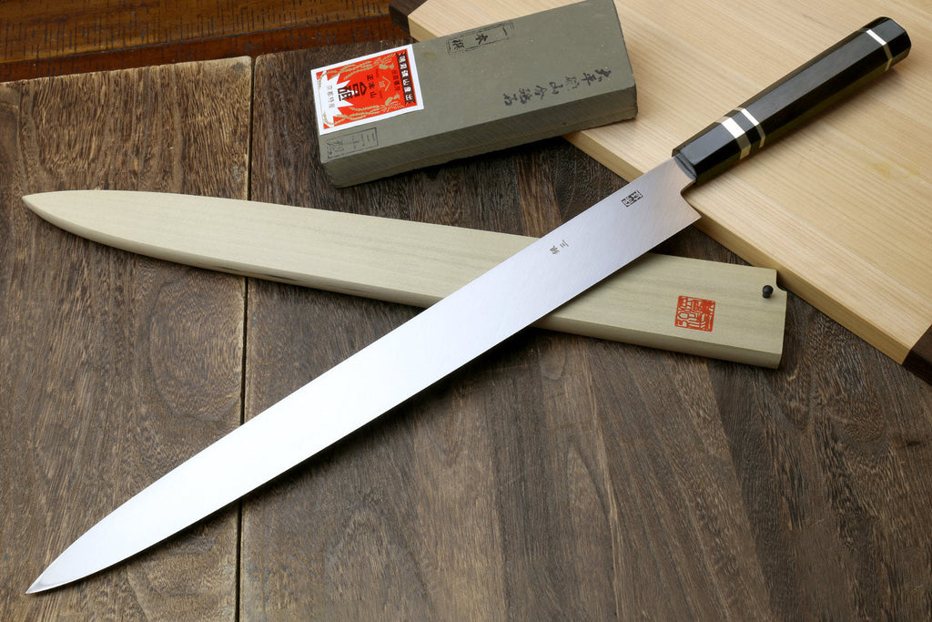 Tuna knife with long mirror-polished steel blade and ebony handle with triple silver rings