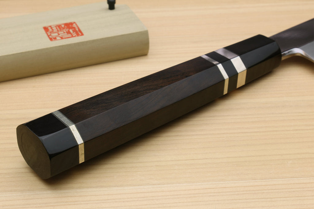 Tuna knife handle end with ebony scales and three silver rings, polished steel blade