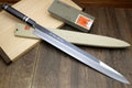Mirror-polished tuna knife with ebony handle and triple silver rings
