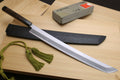 Tuna knife with long silver blade, black sheath, green tassel cord, and box