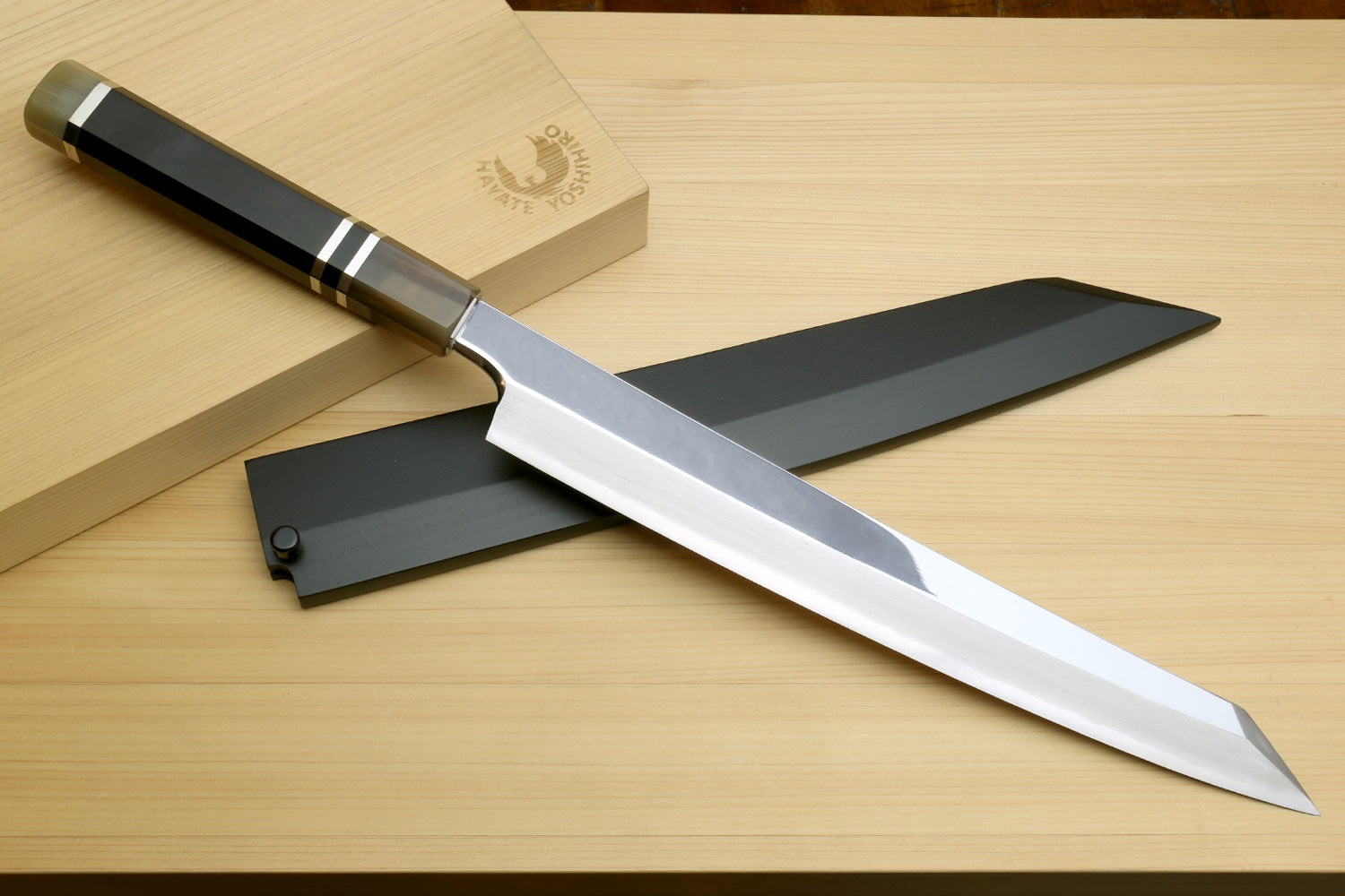 Sushi sashimi knife with mirror-finished stainless blade and ebony handle, gray sheath