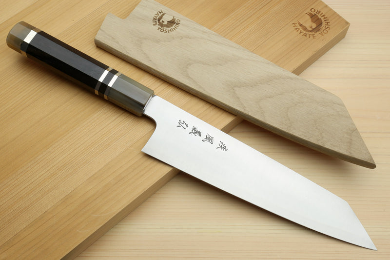 Kiritsuke chef knife with ebony handle and two wooden display blocks