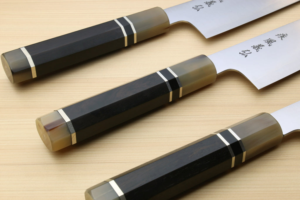 Set of three Kiritsuke chef knives with ebony handles and stainless blades