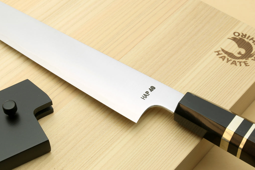 Sujihiki slicer knife blade with SHARP markings and black ebony handle