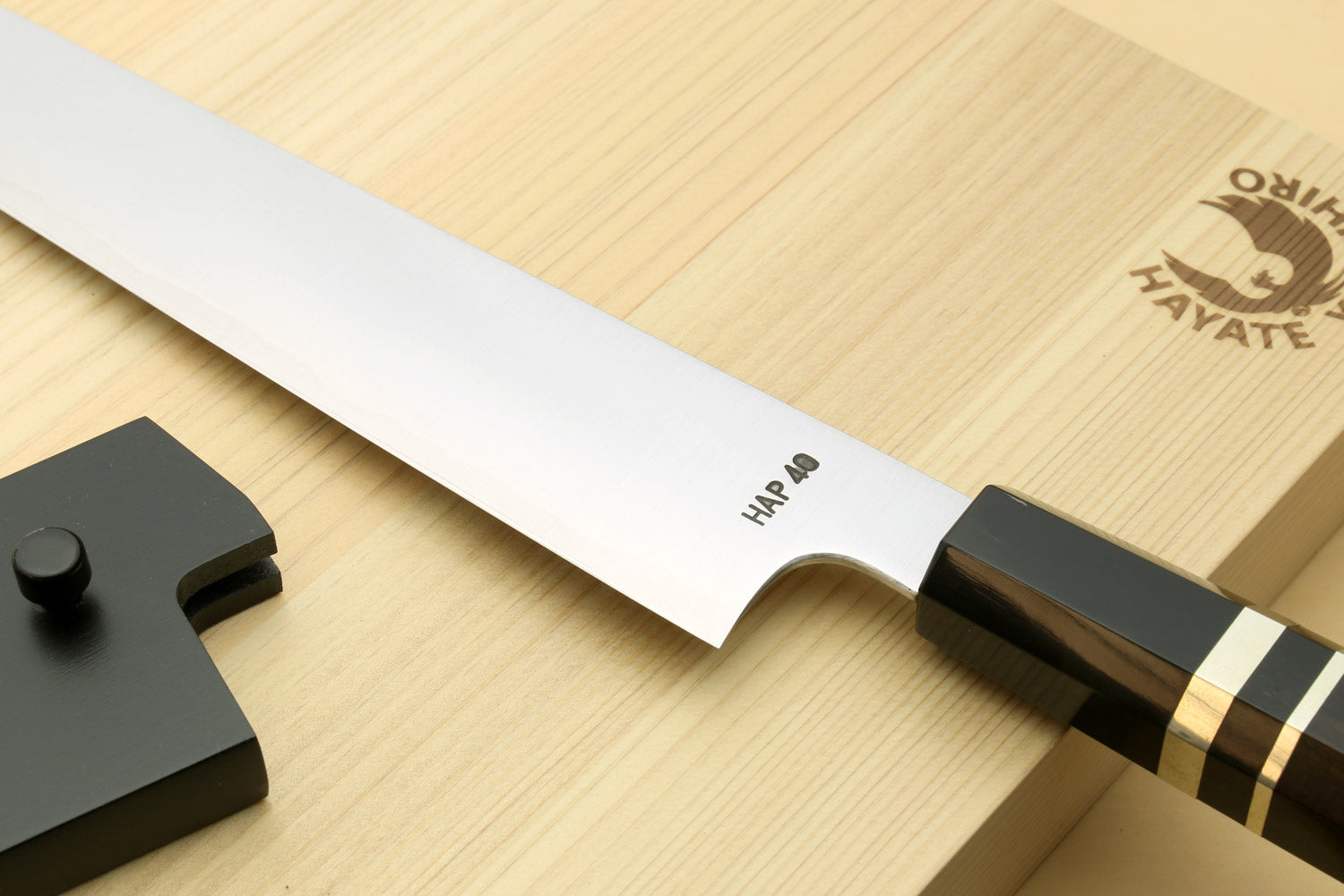 Sujihiki slicer knife blade with SHARP markings and black ebony handle