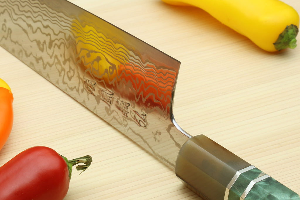 Chef's gyuto knife with rustic Damascus blade and green burl handle