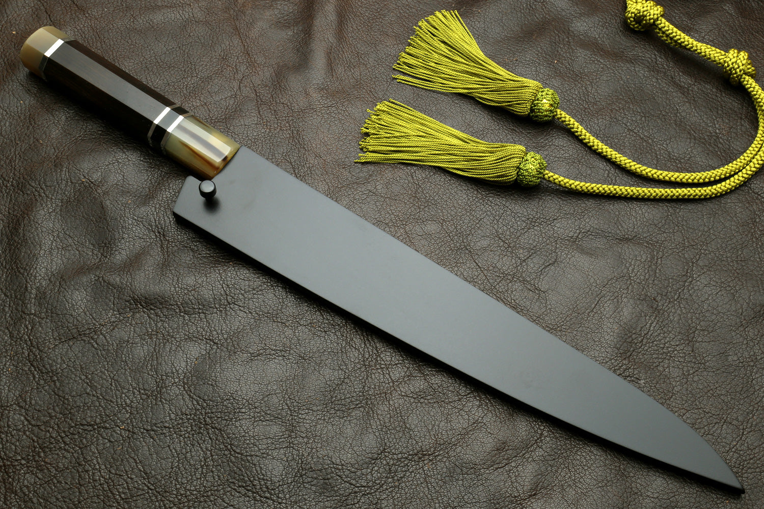 Sujihiki slicer knife with long straight blade and triple-ring handle, green tassel cord