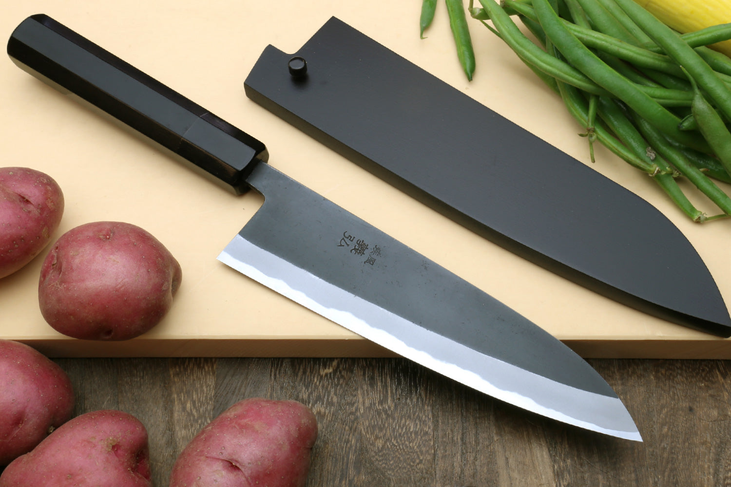 Japanese gyuto chef’s knives with kurouchi blades and ebony handles