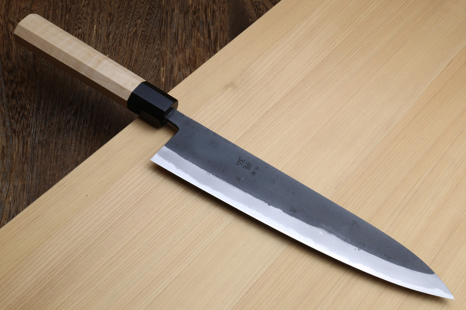 Kurouchi blue steel gyuto knife with light Kaede handle and black collar