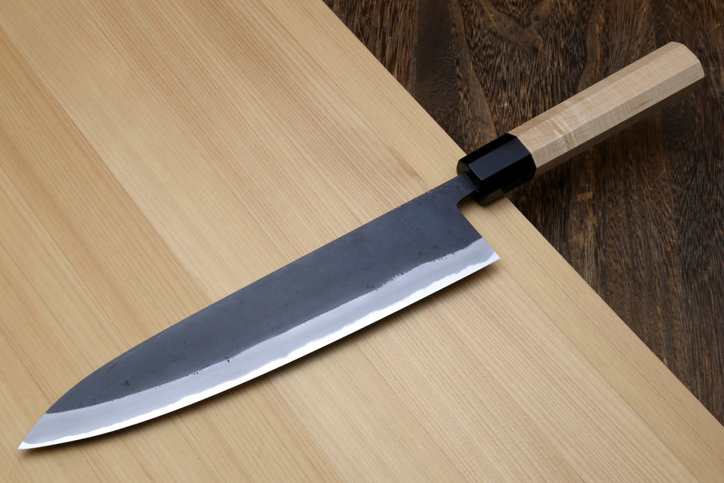 Japanese gyuto knife with blue steel kurouchi blade and light wood Kaede handle