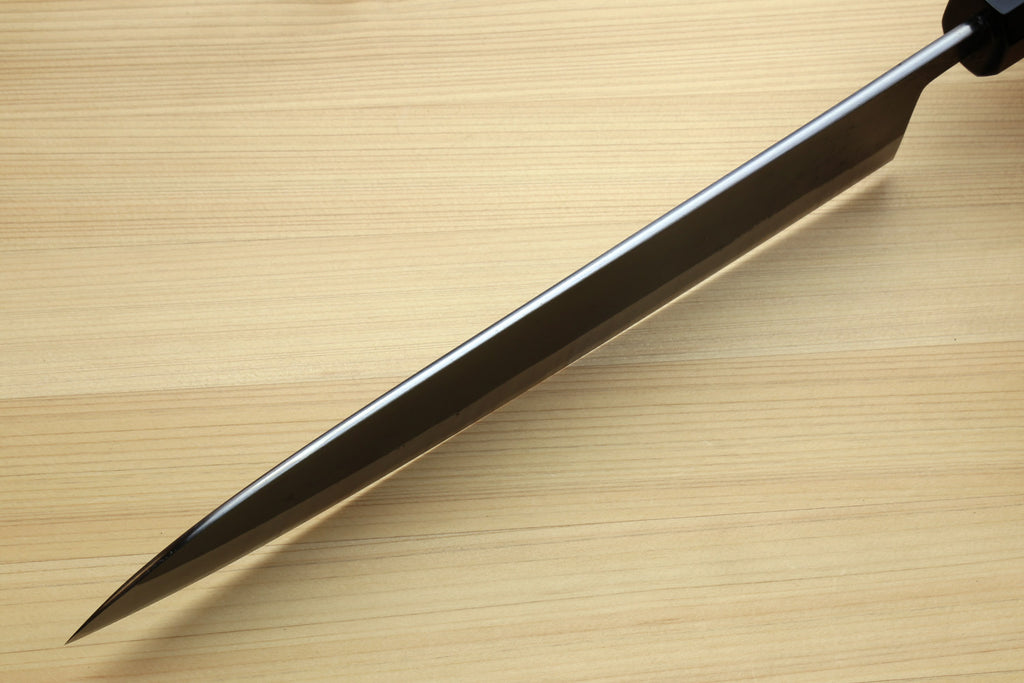 Blue steel kurouchi gyuto knife with pointed tip and light Kaede handle with black collar