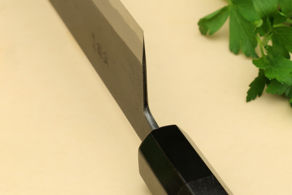 Nakiri knife tang and heel with dark finish and ebony wood handle