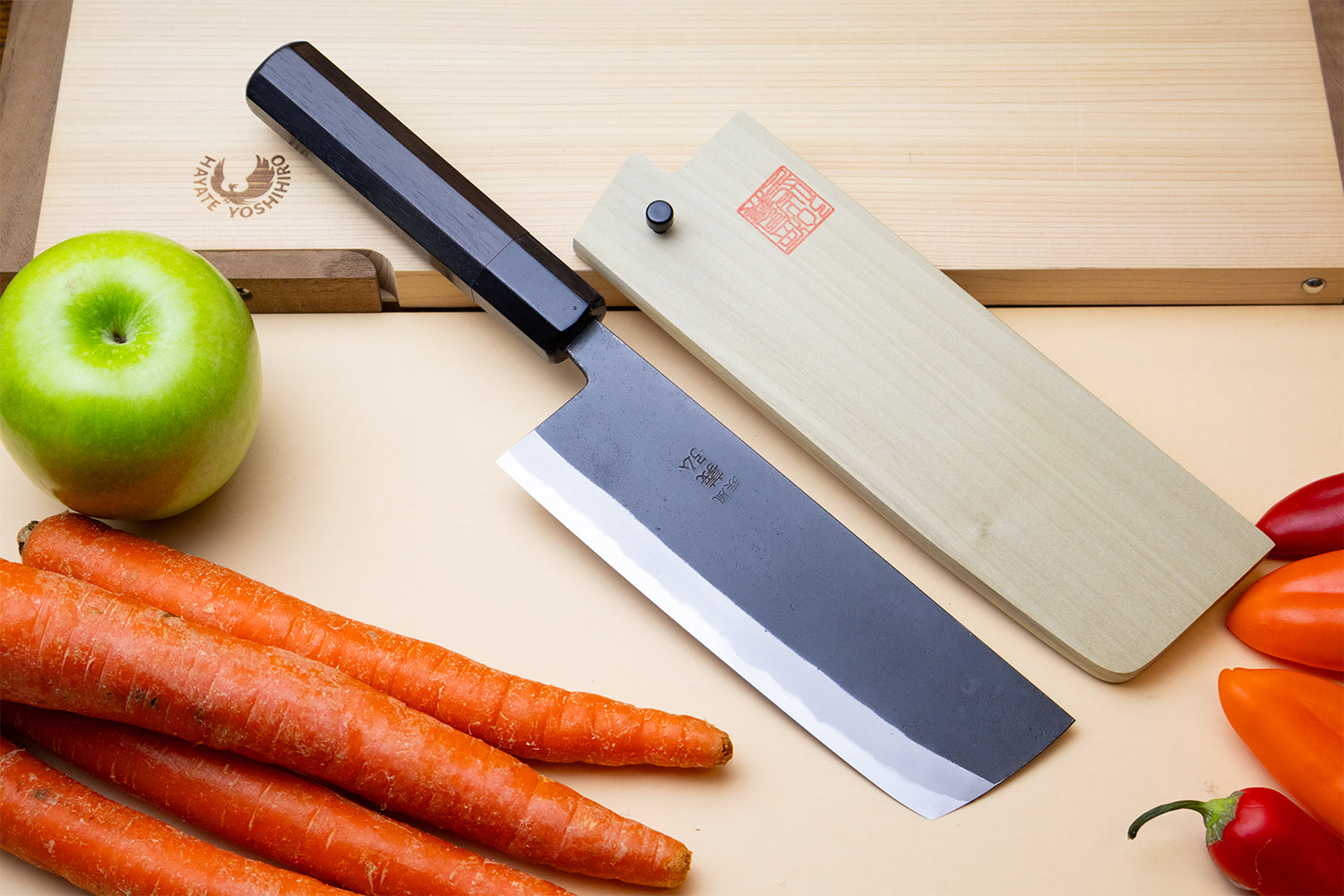Nakiri vegetable knife with ebony handle and wooden saya cover