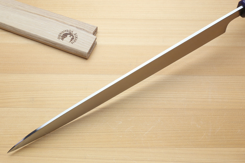Yanagi sushi knife side profile, white blade with dark-blue handle
