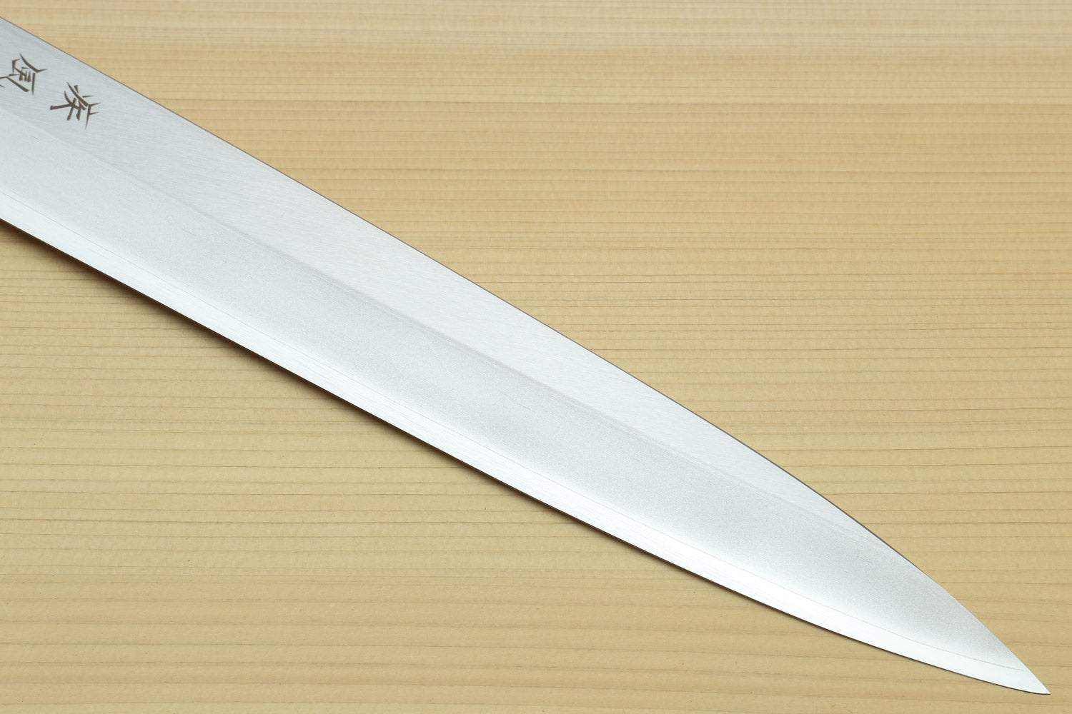 Yanagi sushi knife long blade view, smooth white steel and dark-blue handle