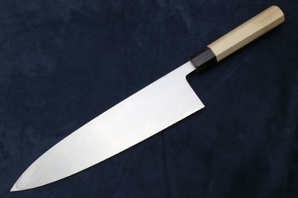 Deba fish fillet knife with plain white blade and light wood handle