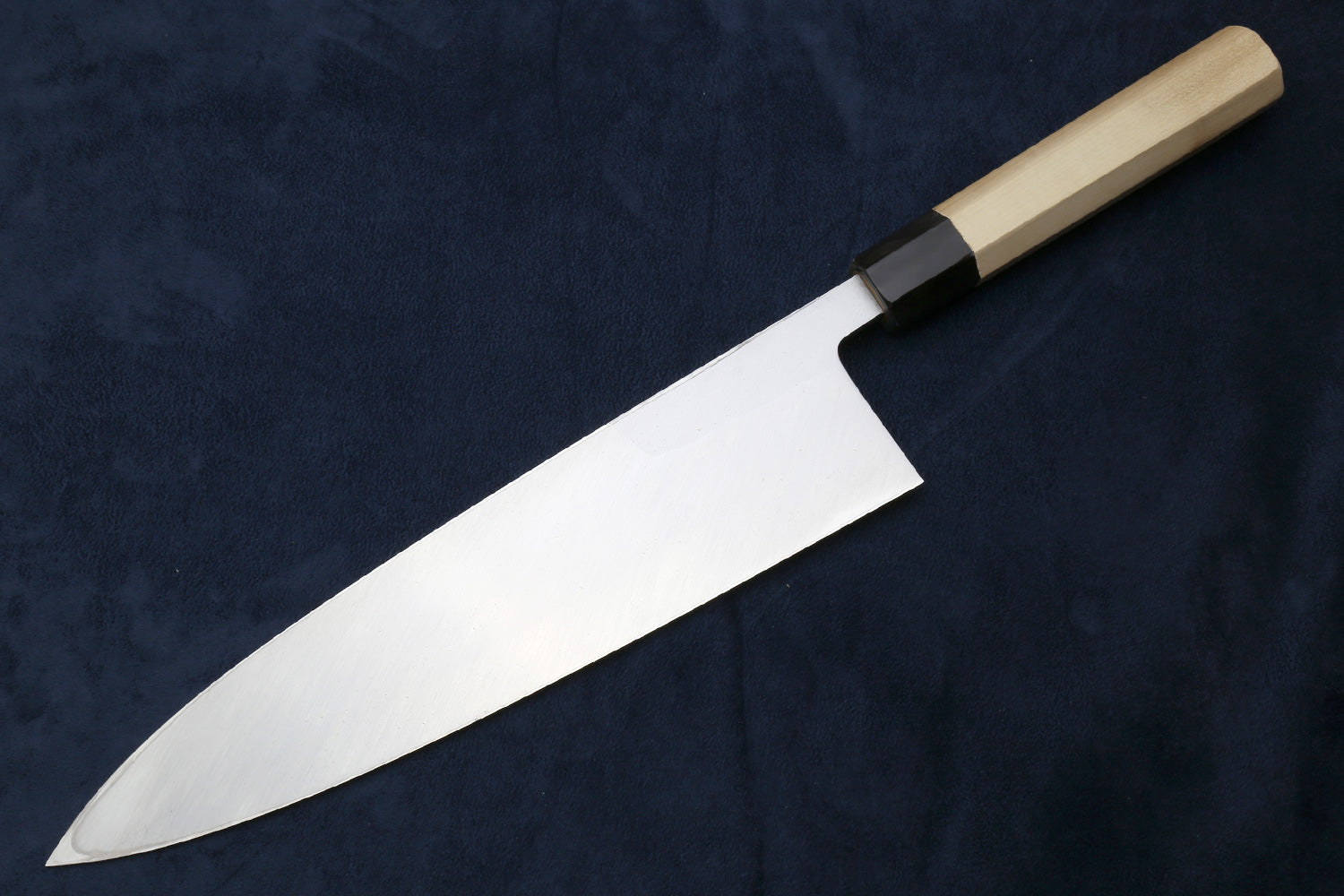 Deba fish fillet knife with plain white blade and light wood handle