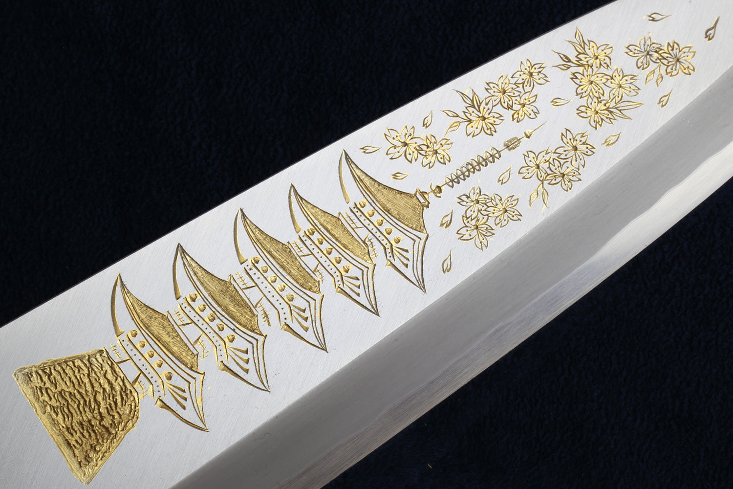 Deba fish fillet knife with white blade and gold floral pattern, wood handle