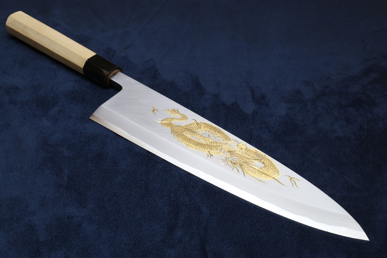 Deba fish fillet knife with white blade and gold dragon motif, light wood handle