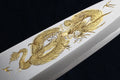 Deba fish fillet knife with white blade and ornate gold dragon etching, wood handle