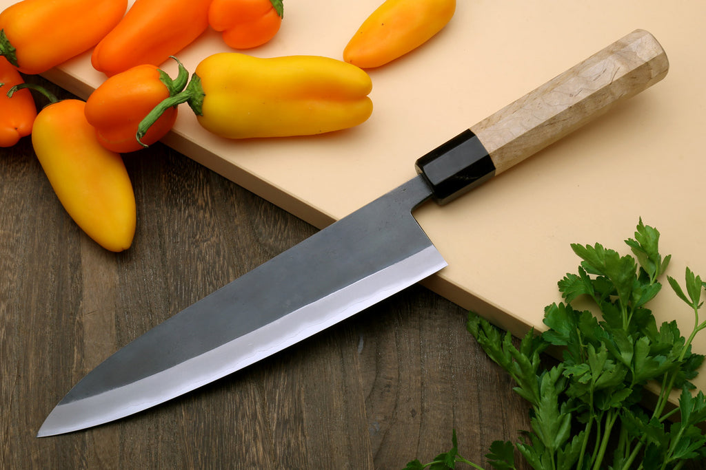 Gyuto chef knife with pointed stainless blade, black collar, Kaede wood handle
