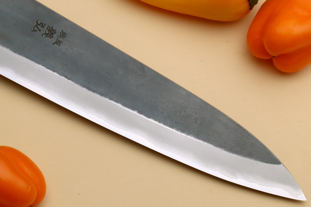 Stainless clad gyuto blade tip with polished edge, Kaede wood handle, black collar