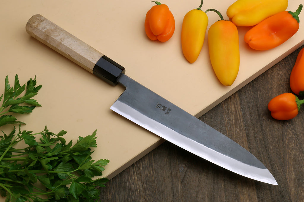 Gyuto chef knife with stainless clad blade and Kaede wood handle, black collar