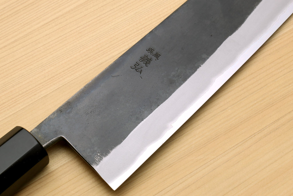 Kiritsuke chef knife blade, dark blue steel with polished edge and stamped marks