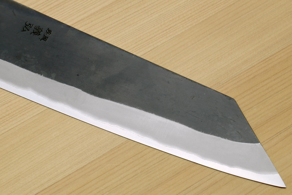 Kiritsuke chef knife blade side, dark blue steel with sharp pointed tip
