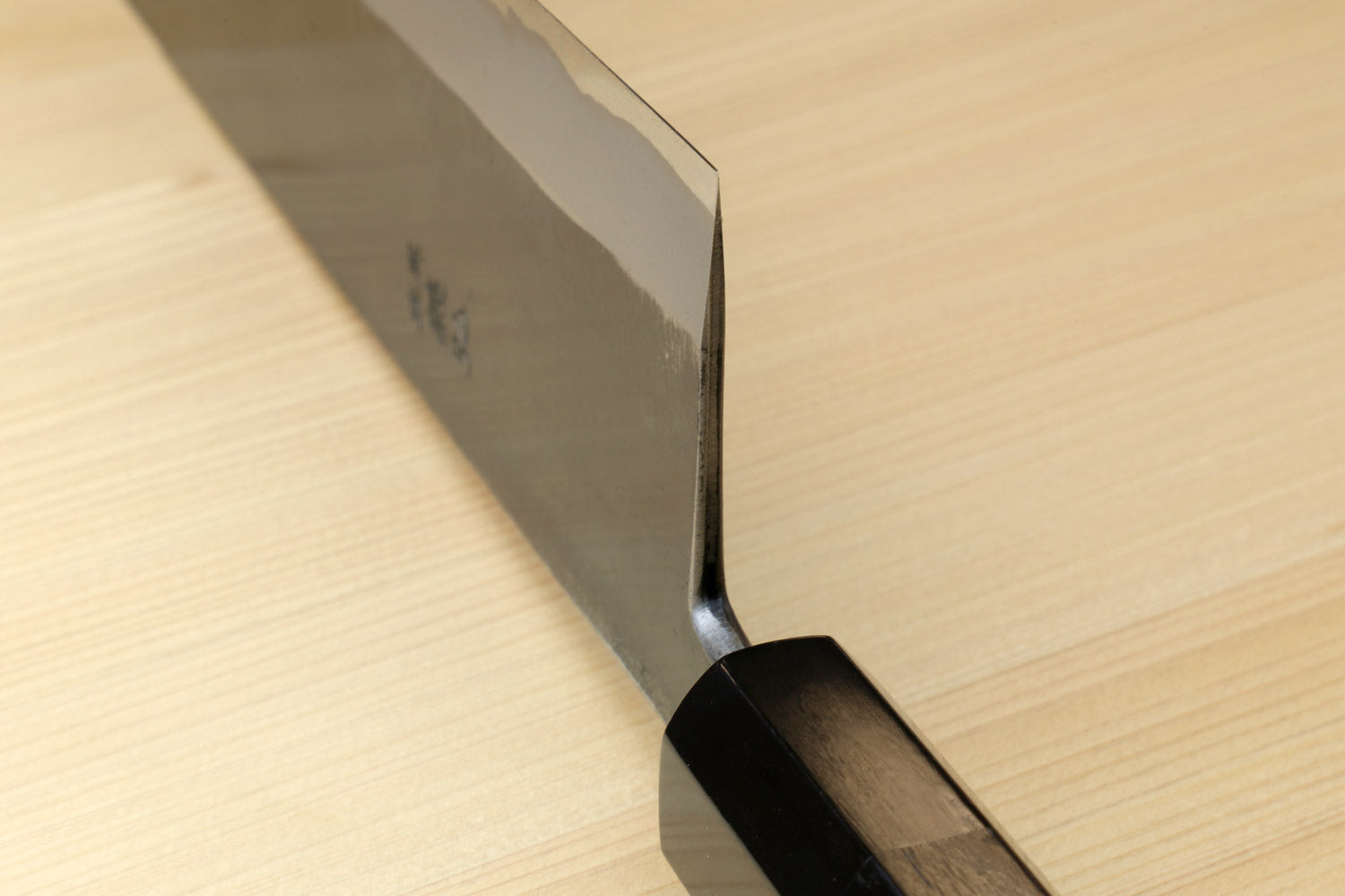 Kiritsuke chef knife with ebony handle, tapered tip and dark blue steel blade