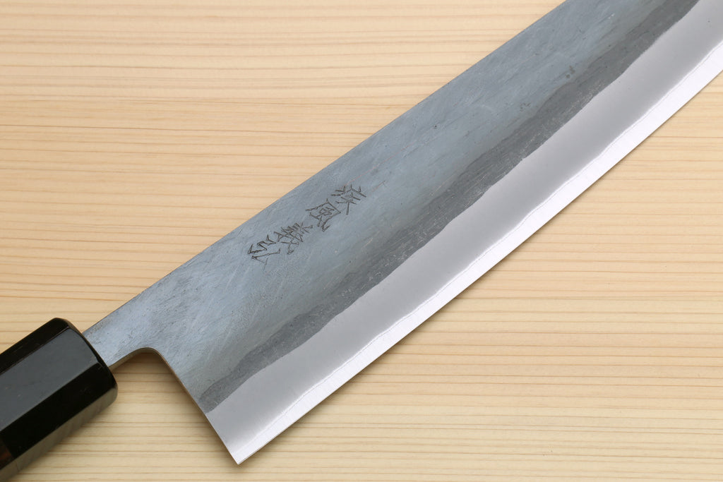 Kiritsuke chef knife, blue-gray blade with etched mark near handle