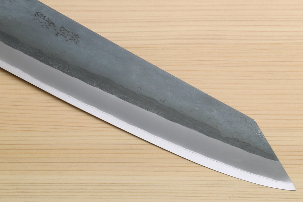 Kiritsuke chef knife tip, blue-gray blade with sharp point and beveled edge