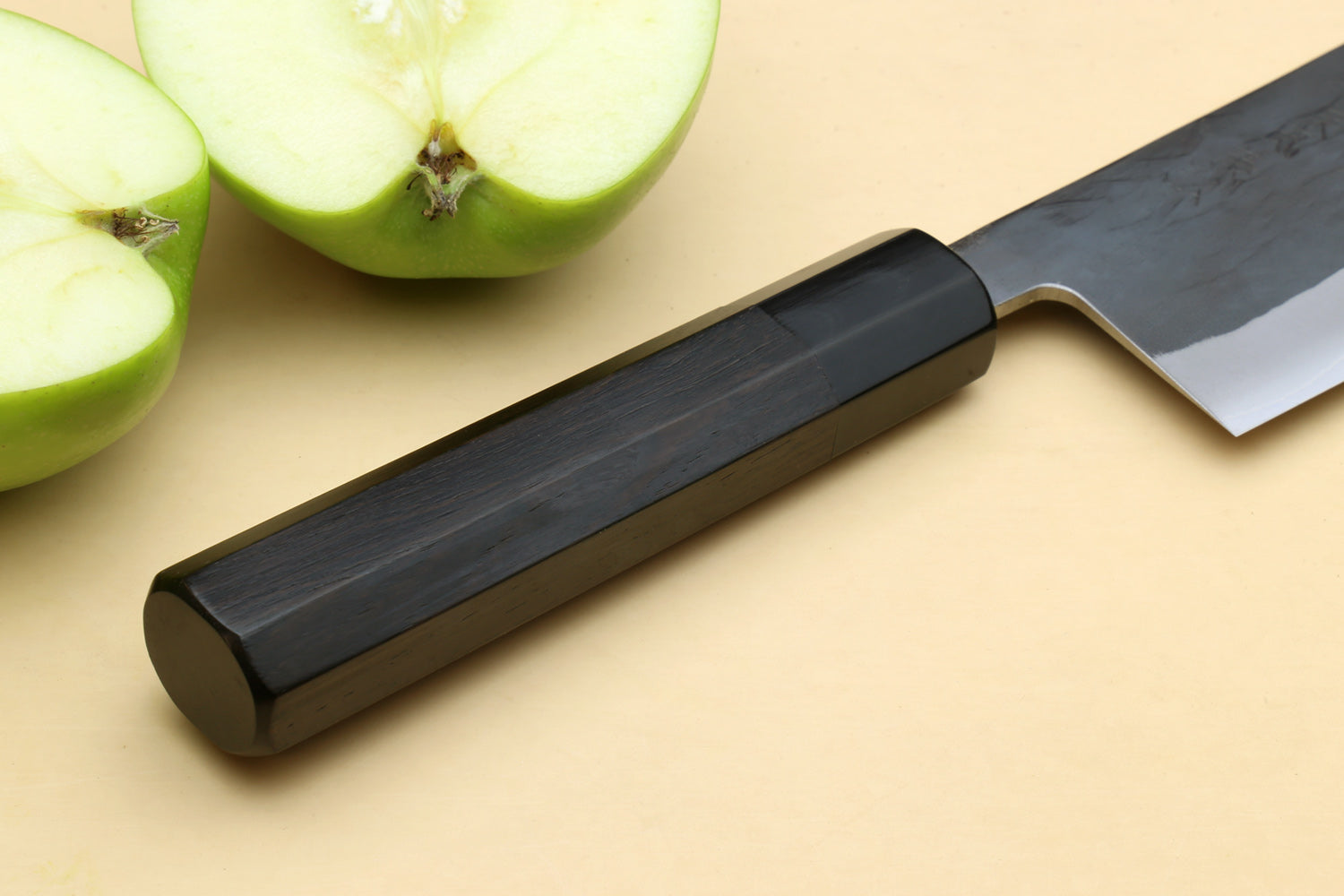 Nakiri vegetable knife with black ebony handle and tapered blue-steel blade
