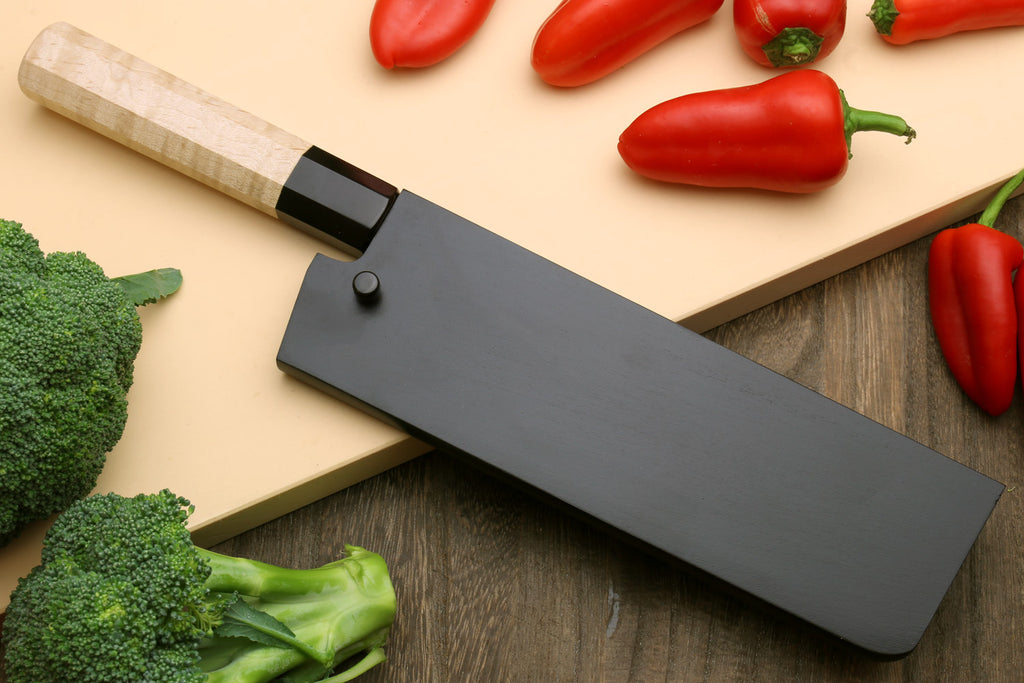 Nakiri vegetable knife front view with black handle and long gray blade