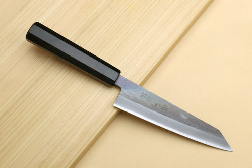 Ebony-handled utility knife with narrow pointed blade, angled view