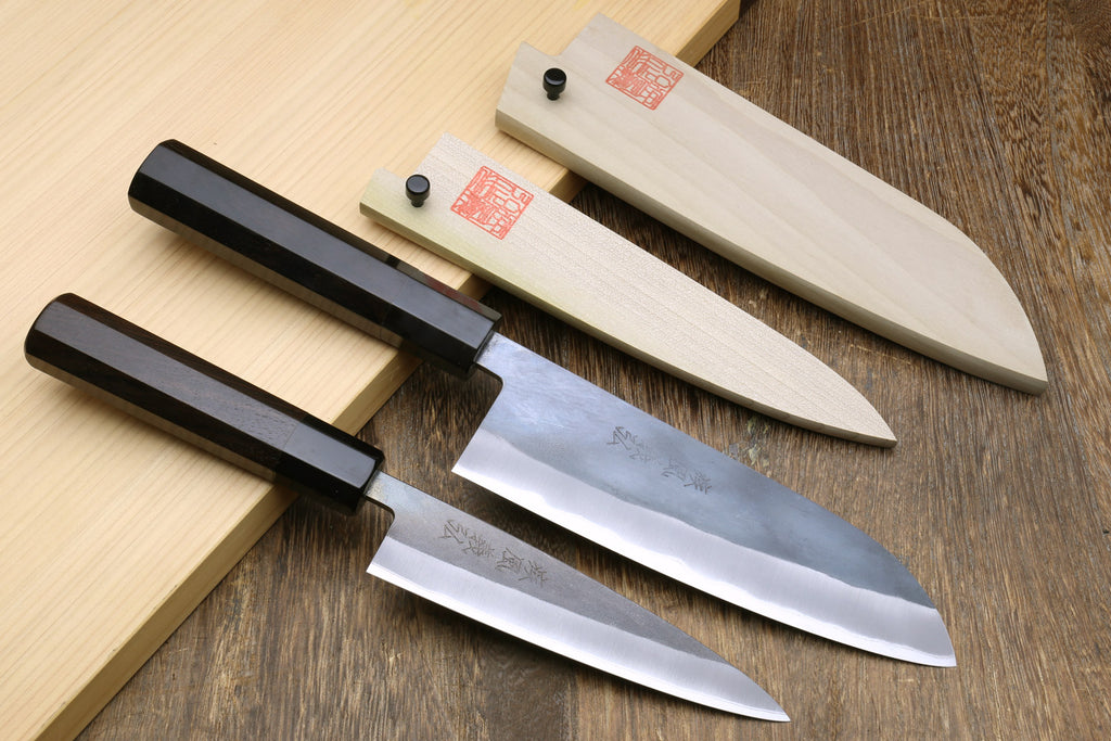 2-piece knife set with black handles, stainless blades, and stamped logo