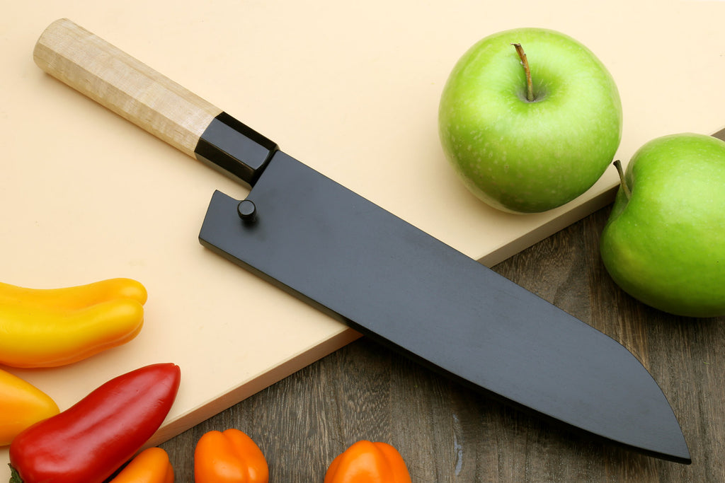 Santoku knife with black sheath and stainless blade, light wood handle