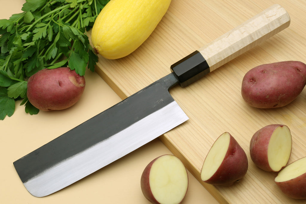 Nakiri vegetable knife with dark steel blade, light camphor handle, rectangular spine