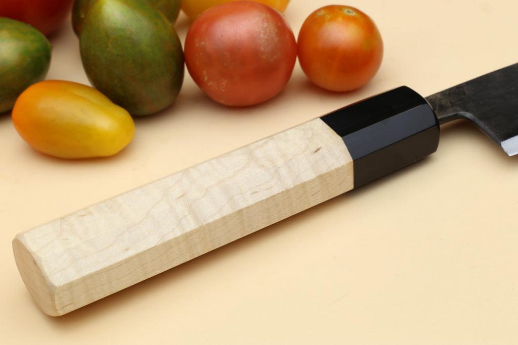 Petty utility Japanese knife with pale camphor handle and black collar, side profile