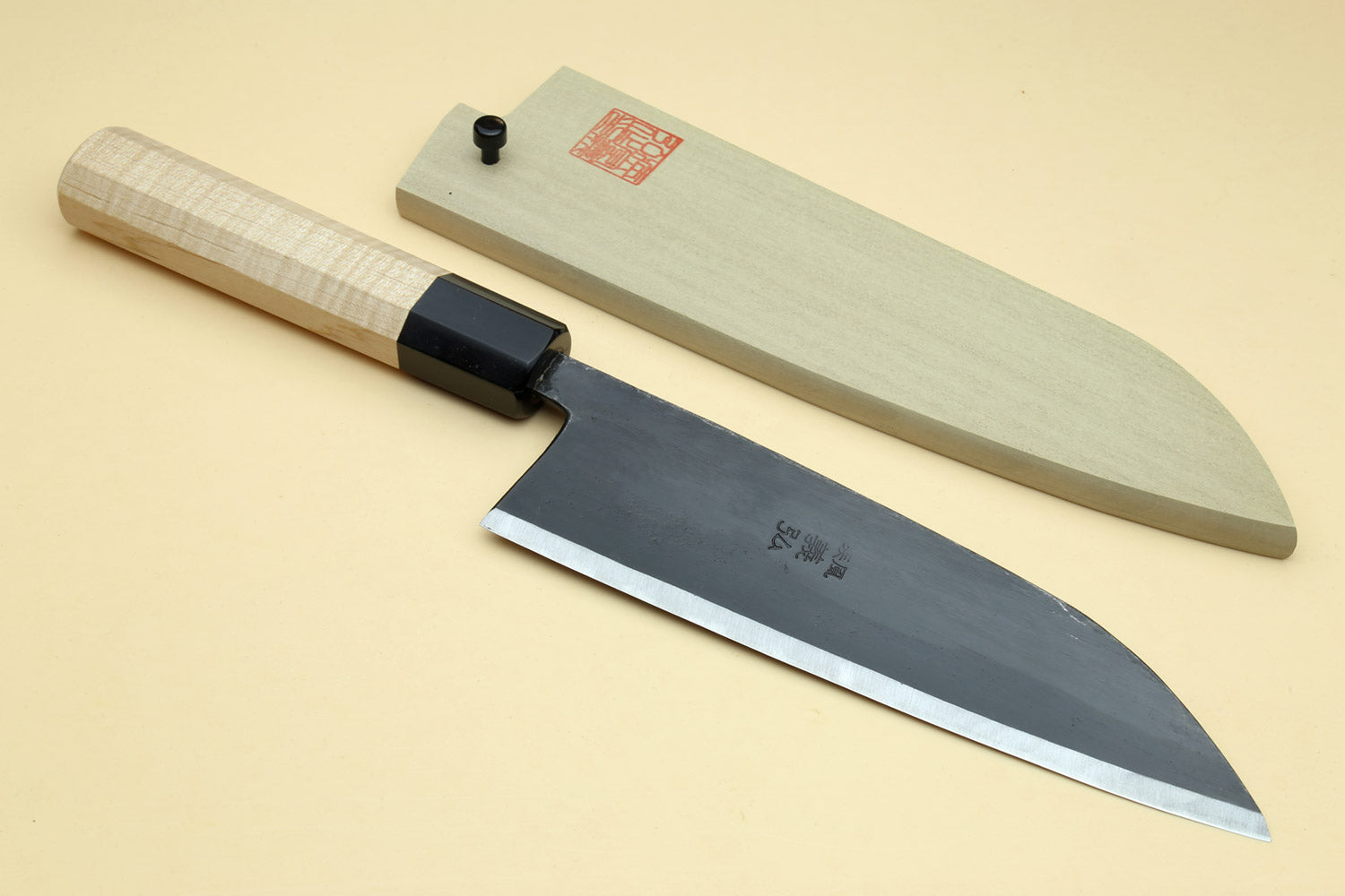 Santoku chef knife and matching sheath with light camphor handle, dark blade