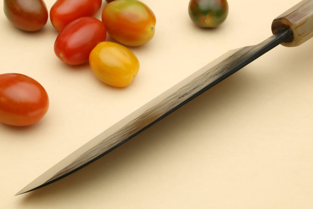 Santoku knife with dark wood handle and hammered stainless blade