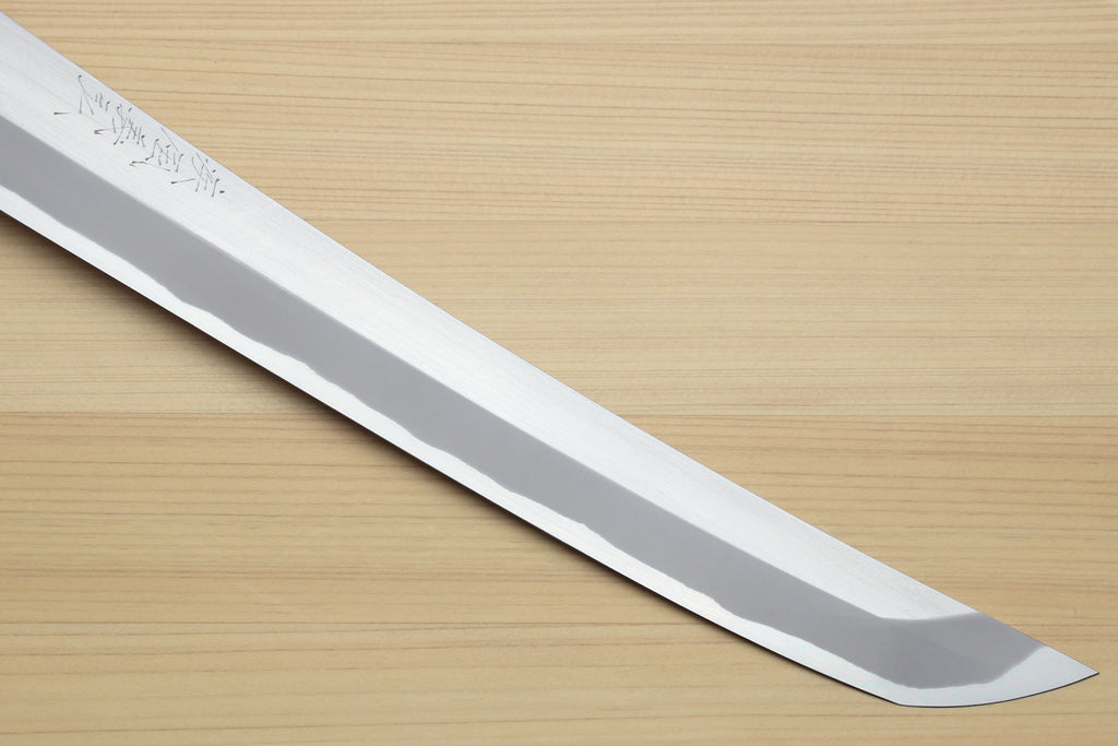 Curved white steel sushi knife blade with narrow edge and rounded spine