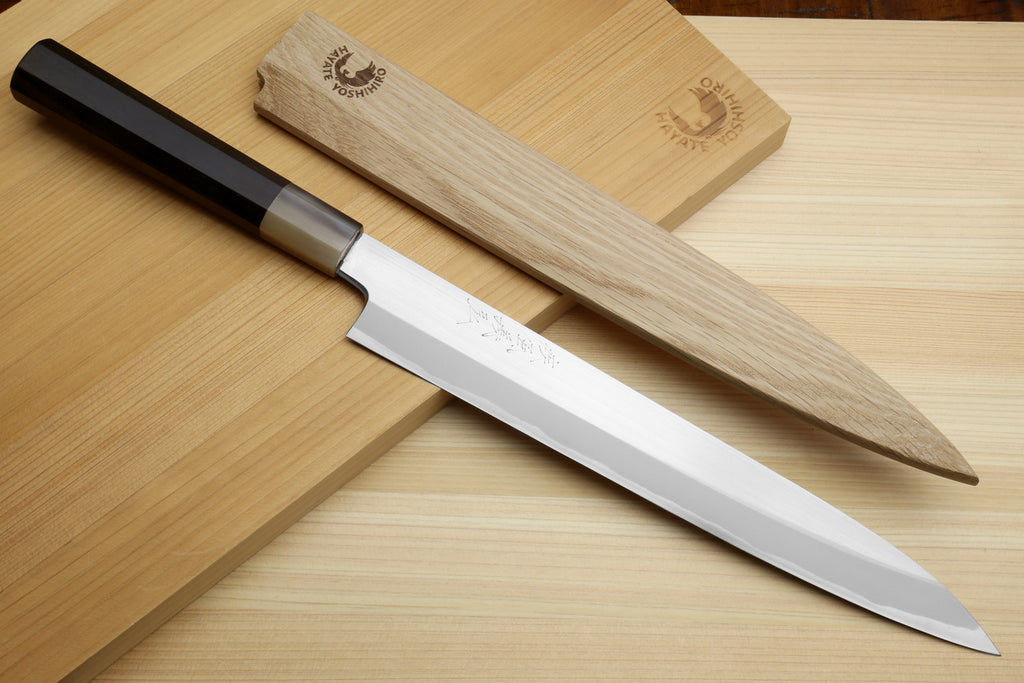 Sashimi yanagiba knife with white blade and dark ebony handle