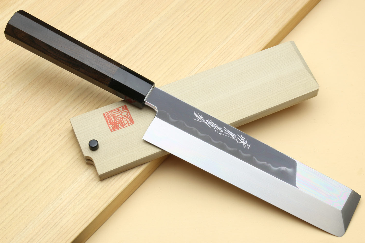 Japanese vegetable knife with white steel blade and dark ebony handle, mirror-polished